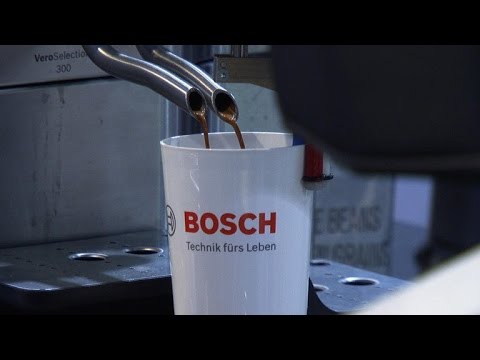 Robot barista makes custom coffee